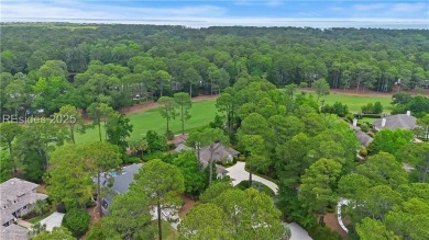 Tucked away on a quiet cul-de-sac street in the Oyster Reef area on Oyster Reef Golf Course in South Carolina - for sale on GolfHomes.com, golf home, golf lot