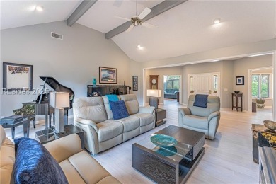Tucked away on a quiet cul-de-sac street in the Oyster Reef area on Oyster Reef Golf Course in South Carolina - for sale on GolfHomes.com, golf home, golf lot