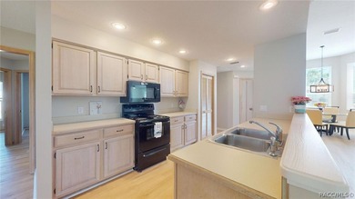 Welcome to this beautifully updated golf course home offering on Citrus Hills Golf Club in Florida - for sale on GolfHomes.com, golf home, golf lot