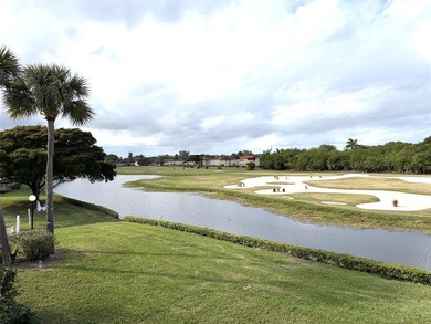 Beautiful Lake and Golf Course Views From This Two Bedroom / Two on The American Golf Club in Florida - for sale on GolfHomes.com, golf home, golf lot