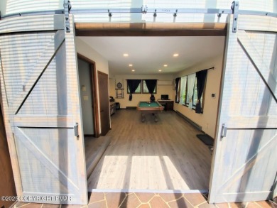 Spacious 4-bedroom, 2.5-bathroom home in Pocono Farms Country on Pocono Farms Country Club in Pennsylvania - for sale on GolfHomes.com, golf home, golf lot