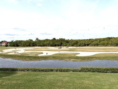 Beautiful Lake and Golf Course Views From This Two Bedroom / Two on The American Golf Club in Florida - for sale on GolfHomes.com, golf home, golf lot