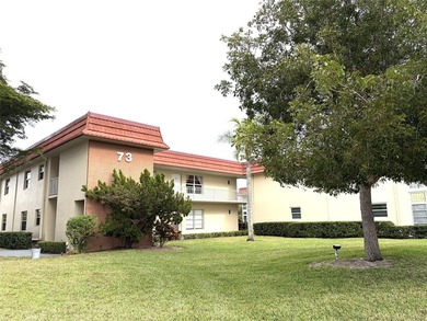 Meticulously Kept Two Bedroom / Two Bath Condo with Beautiful on The American Golf Club in Florida - for sale on GolfHomes.com, golf home, golf lot