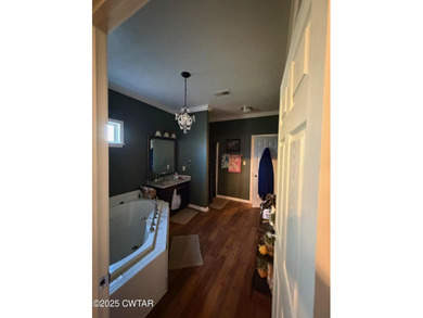 Wonderful 4BR 3BA, 2 car garage, fenced back yard with pergola on Dyersburg Country Club At The Farms in Tennessee - for sale on GolfHomes.com, golf home, golf lot