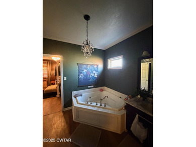 Wonderful 4BR 3BA, 2 car garage, fenced back yard with pergola on Dyersburg Country Club At The Farms in Tennessee - for sale on GolfHomes.com, golf home, golf lot