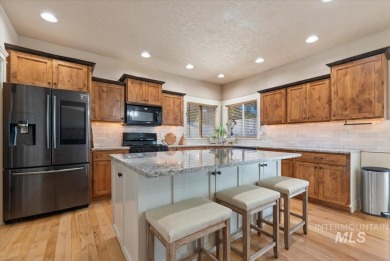This stunning home, near RedHawk Golf Course, sits on a on Hunters Point Golf Club in Idaho - for sale on GolfHomes.com, golf home, golf lot