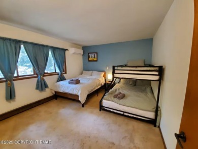 Spacious 4-bedroom, 2.5-bathroom home in Pocono Farms Country on Pocono Farms Country Club in Pennsylvania - for sale on GolfHomes.com, golf home, golf lot