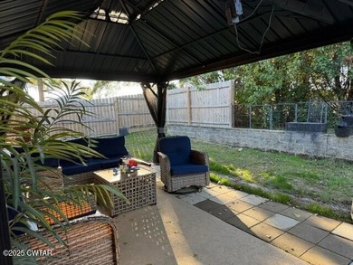 Wonderful 4BR 3BA, 2 car garage, fenced back yard with pergola on Dyersburg Country Club At The Farms in Tennessee - for sale on GolfHomes.com, golf home, golf lot