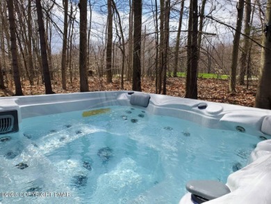 Spacious 4-bedroom, 2.5-bathroom home in Pocono Farms Country on Pocono Farms Country Club in Pennsylvania - for sale on GolfHomes.com, golf home, golf lot