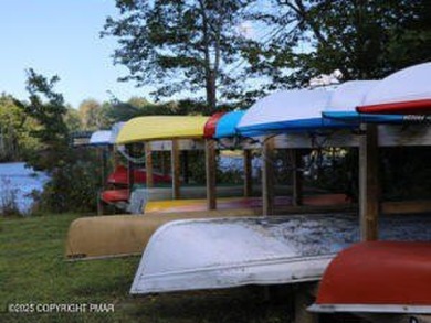 Spacious 4-bedroom, 2.5-bathroom home in Pocono Farms Country on Pocono Farms Country Club in Pennsylvania - for sale on GolfHomes.com, golf home, golf lot
