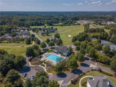 This stunning home seamlessly blends comfort and charm with on Hampton Golf Village in Georgia - for sale on GolfHomes.com, golf home, golf lot