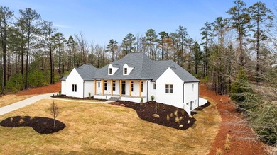 Built by Hawes Homes, this spacious Brick Ranch situated on a on Harbor Club Golf and Country Club in Georgia - for sale on GolfHomes.com, golf home, golf lot
