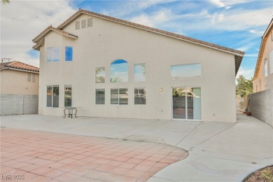 Experience refined living in this elegant 4-bedroom, 3-bath on Rhodes Ranch Golf Club in Nevada - for sale on GolfHomes.com, golf home, golf lot