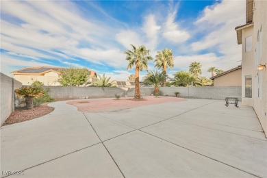 Experience refined living in this elegant 4-bedroom, 3-bath on Rhodes Ranch Golf Club in Nevada - for sale on GolfHomes.com, golf home, golf lot