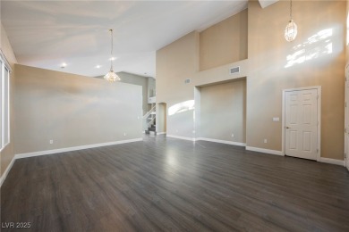 Experience refined living in this elegant 4-bedroom, 3-bath on Rhodes Ranch Golf Club in Nevada - for sale on GolfHomes.com, golf home, golf lot