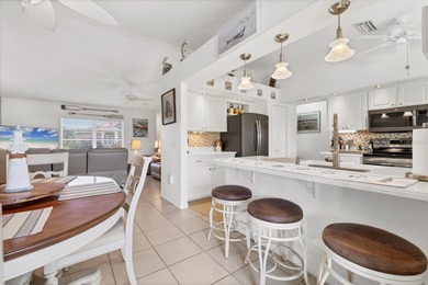 This beautifully updated home invites you to step right in and on Rotonda Golf and Country Club The Palms Course in Florida - for sale on GolfHomes.com, golf home, golf lot