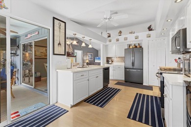 This beautifully updated home invites you to step right in and on Rotonda Golf and Country Club The Palms Course in Florida - for sale on GolfHomes.com, golf home, golf lot