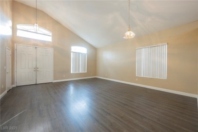 Experience refined living in this elegant 4-bedroom, 3-bath on Rhodes Ranch Golf Club in Nevada - for sale on GolfHomes.com, golf home, golf lot