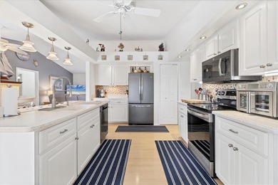 This beautifully updated home invites you to step right in and on Rotonda Golf and Country Club The Palms Course in Florida - for sale on GolfHomes.com, golf home, golf lot