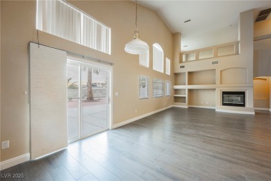 Experience refined living in this elegant 4-bedroom, 3-bath on Rhodes Ranch Golf Club in Nevada - for sale on GolfHomes.com, golf home, golf lot
