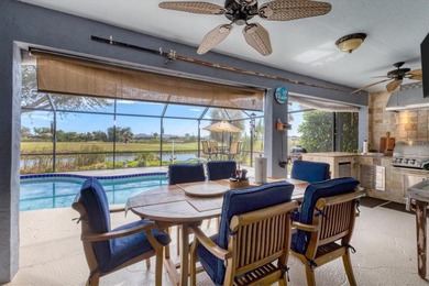 This beautifully updated home invites you to step right in and on Rotonda Golf and Country Club The Palms Course in Florida - for sale on GolfHomes.com, golf home, golf lot