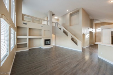 Experience refined living in this elegant 4-bedroom, 3-bath on Rhodes Ranch Golf Club in Nevada - for sale on GolfHomes.com, golf home, golf lot