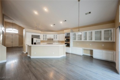 Experience refined living in this elegant 4-bedroom, 3-bath on Rhodes Ranch Golf Club in Nevada - for sale on GolfHomes.com, golf home, golf lot