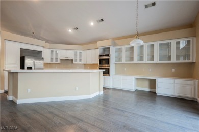 Experience refined living in this elegant 4-bedroom, 3-bath on Rhodes Ranch Golf Club in Nevada - for sale on GolfHomes.com, golf home, golf lot
