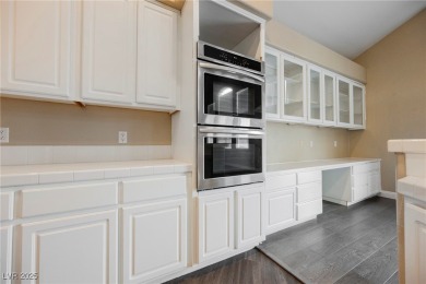Experience refined living in this elegant 4-bedroom, 3-bath on Rhodes Ranch Golf Club in Nevada - for sale on GolfHomes.com, golf home, golf lot