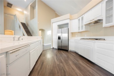 Experience refined living in this elegant 4-bedroom, 3-bath on Rhodes Ranch Golf Club in Nevada - for sale on GolfHomes.com, golf home, golf lot