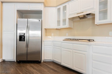 Experience refined living in this elegant 4-bedroom, 3-bath on Rhodes Ranch Golf Club in Nevada - for sale on GolfHomes.com, golf home, golf lot