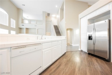Experience refined living in this elegant 4-bedroom, 3-bath on Rhodes Ranch Golf Club in Nevada - for sale on GolfHomes.com, golf home, golf lot