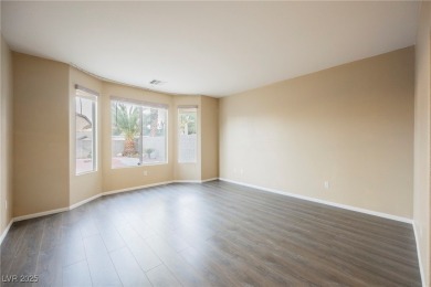 Experience refined living in this elegant 4-bedroom, 3-bath on Rhodes Ranch Golf Club in Nevada - for sale on GolfHomes.com, golf home, golf lot