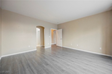 Experience refined living in this elegant 4-bedroom, 3-bath on Rhodes Ranch Golf Club in Nevada - for sale on GolfHomes.com, golf home, golf lot
