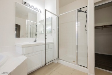 Experience refined living in this elegant 4-bedroom, 3-bath on Rhodes Ranch Golf Club in Nevada - for sale on GolfHomes.com, golf home, golf lot