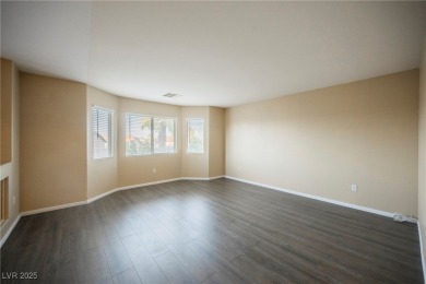 Experience refined living in this elegant 4-bedroom, 3-bath on Rhodes Ranch Golf Club in Nevada - for sale on GolfHomes.com, golf home, golf lot