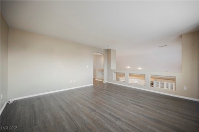 Experience refined living in this elegant 4-bedroom, 3-bath on Rhodes Ranch Golf Club in Nevada - for sale on GolfHomes.com, golf home, golf lot