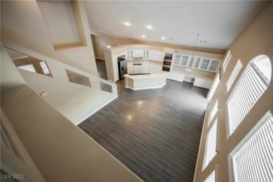 Experience refined living in this elegant 4-bedroom, 3-bath on Rhodes Ranch Golf Club in Nevada - for sale on GolfHomes.com, golf home, golf lot
