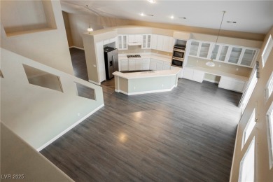 Experience refined living in this elegant 4-bedroom, 3-bath on Rhodes Ranch Golf Club in Nevada - for sale on GolfHomes.com, golf home, golf lot