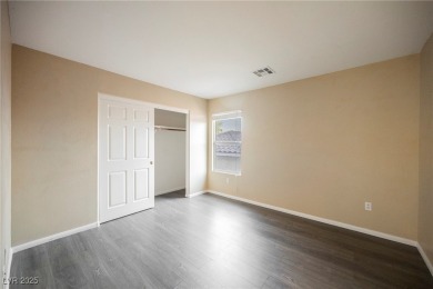 Experience refined living in this elegant 4-bedroom, 3-bath on Rhodes Ranch Golf Club in Nevada - for sale on GolfHomes.com, golf home, golf lot