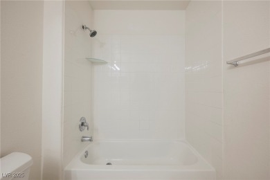Experience refined living in this elegant 4-bedroom, 3-bath on Rhodes Ranch Golf Club in Nevada - for sale on GolfHomes.com, golf home, golf lot