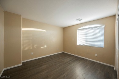 Experience refined living in this elegant 4-bedroom, 3-bath on Rhodes Ranch Golf Club in Nevada - for sale on GolfHomes.com, golf home, golf lot