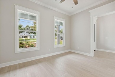 Quality construction with expansive marsh views! Finished in on The Golf Club At Sanctuary Cove in Georgia - for sale on GolfHomes.com, golf home, golf lot