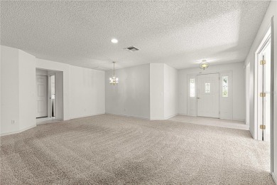 MOTIVATED SELLER WILL REVIEW ALL OFFERS! Spacious Hanover Model on On Top of the World Golf Course in Florida - for sale on GolfHomes.com, golf home, golf lot