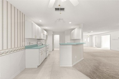 MOTIVATED SELLER WILL REVIEW ALL OFFERS! Spacious Hanover Model on On Top of the World Golf Course in Florida - for sale on GolfHomes.com, golf home, golf lot