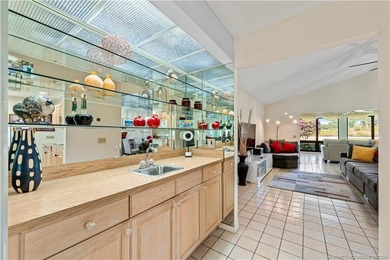 Beautifully Furnished and Completely Turnkey-This is a great on Eagle Wood Golf Course in Florida - for sale on GolfHomes.com, golf home, golf lot