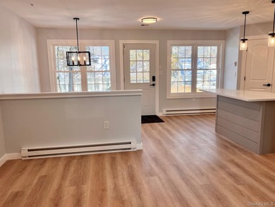 Reimagined. Elevated to a new level. This completely transformed on Leisure Village Golf Course in New York - for sale on GolfHomes.com, golf home, golf lot