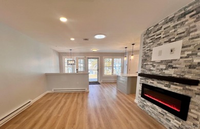 Reimagined. Elevated to a new level. This completely transformed on Leisure Village Golf Course in New York - for sale on GolfHomes.com, golf home, golf lot