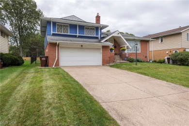 Welcome to 6921 Hollywood Dr in Parma, a lovely split-level home on Ridgewood Golf Course in Ohio - for sale on GolfHomes.com, golf home, golf lot