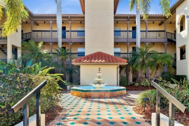 Welcome to your new home in the guard-gated Audubon condominium on Feather Sound Country Club in Florida - for sale on GolfHomes.com, golf home, golf lot